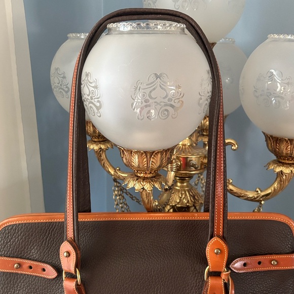 Do not buy this is on hold
Dooney & Bourke Black and Brown - Picture 3 of 15